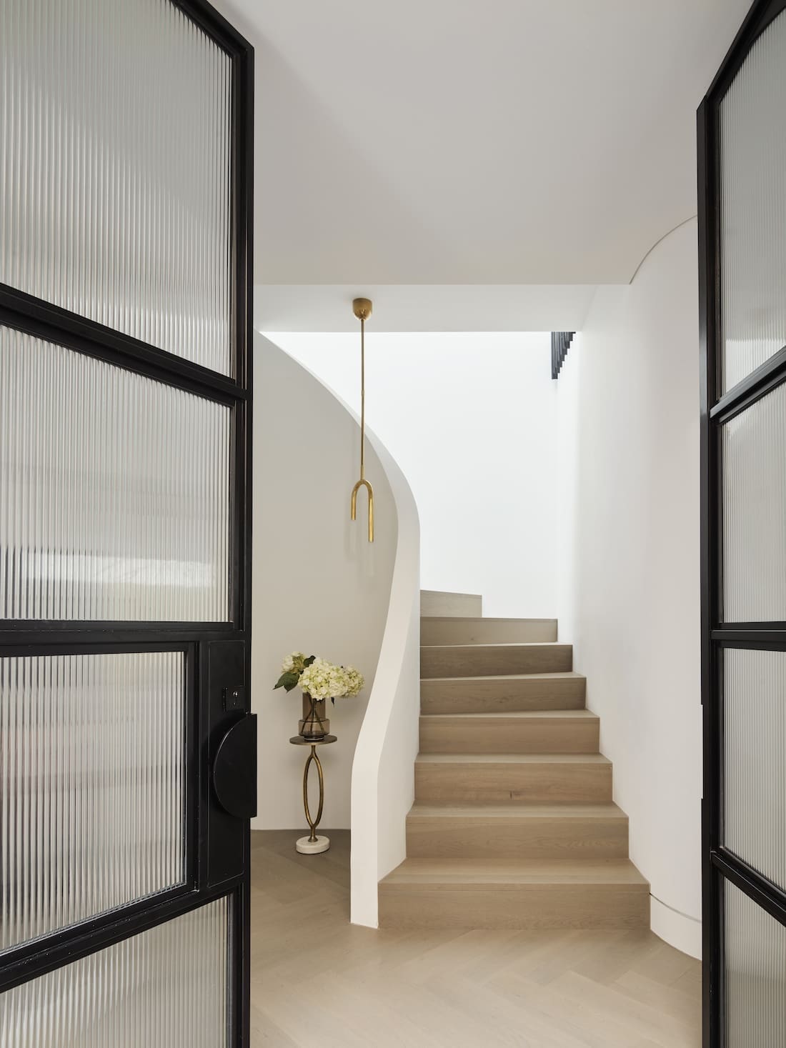 white staircase _ blush powder room
