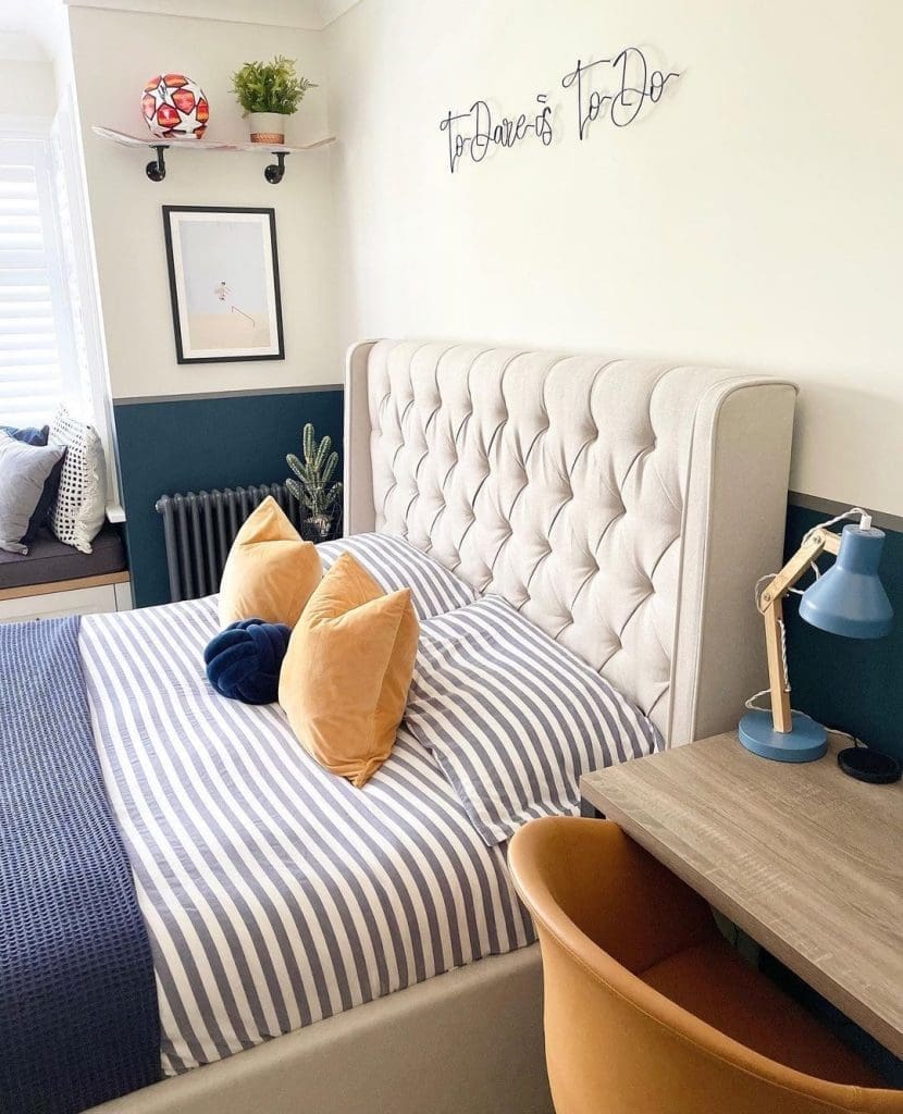 Teen boy bedroom in mustard and navy