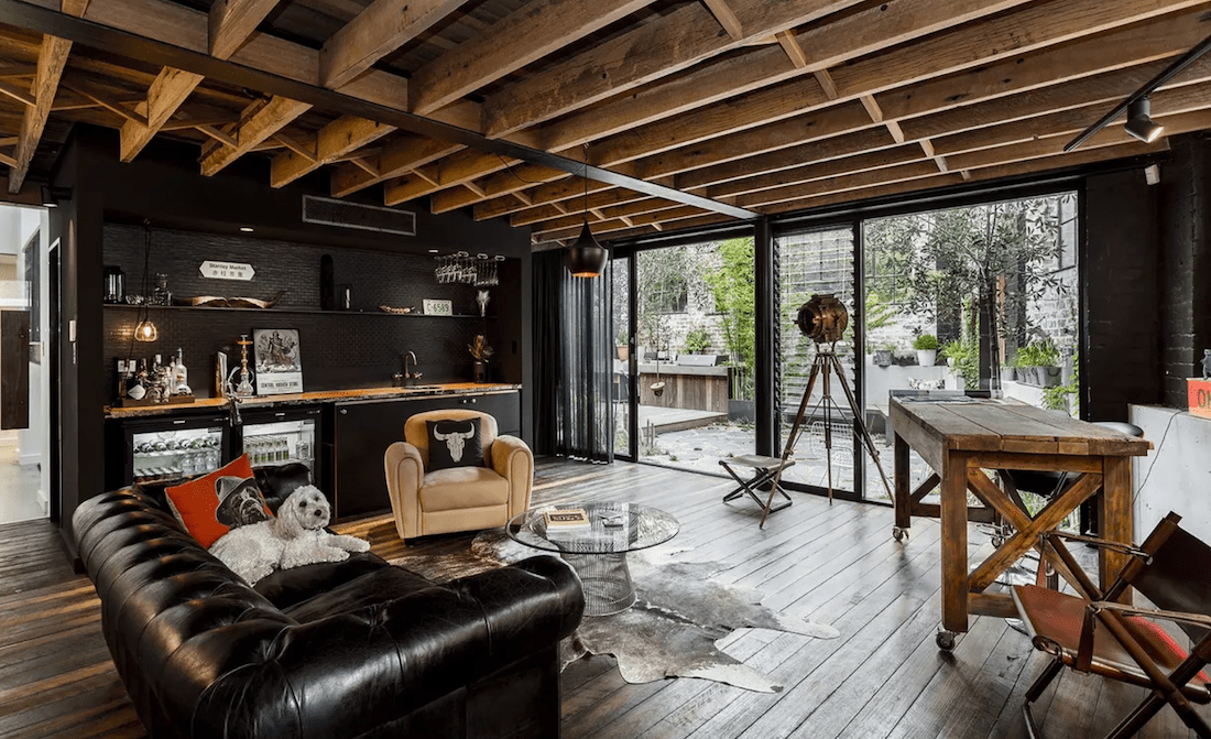 Exposed beams in rustic man cave