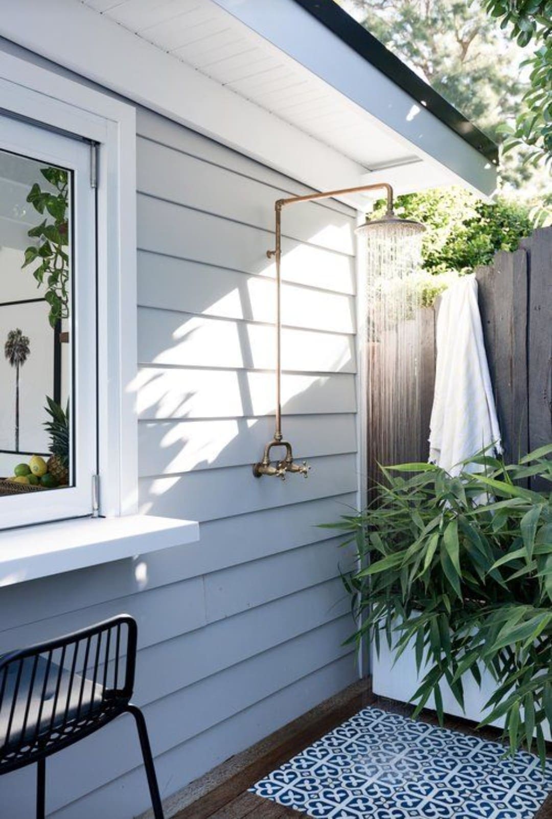 Tiled floor outdoor shower