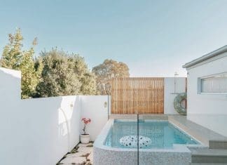 Blush mosaic pool with curved edge