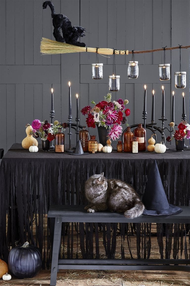 witchy broom chandelier