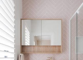 Pink herringbone tile ensuite