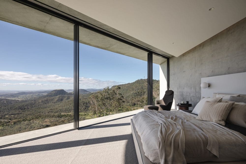 Concrete and glass bedroom