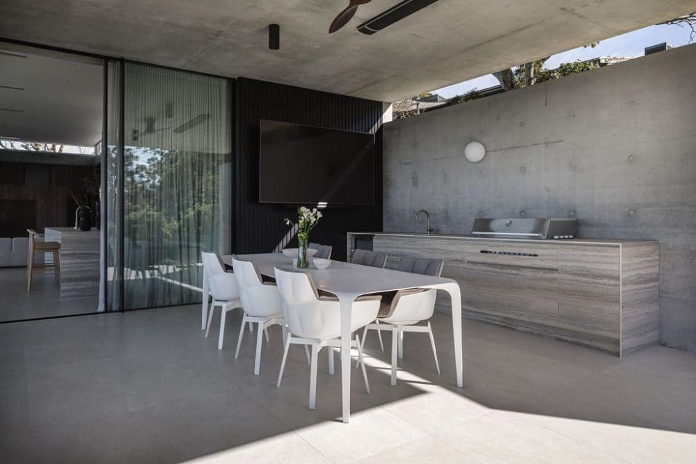 Outdoor kitchen with natural stone bench top
