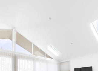Upstairs living room with statement window