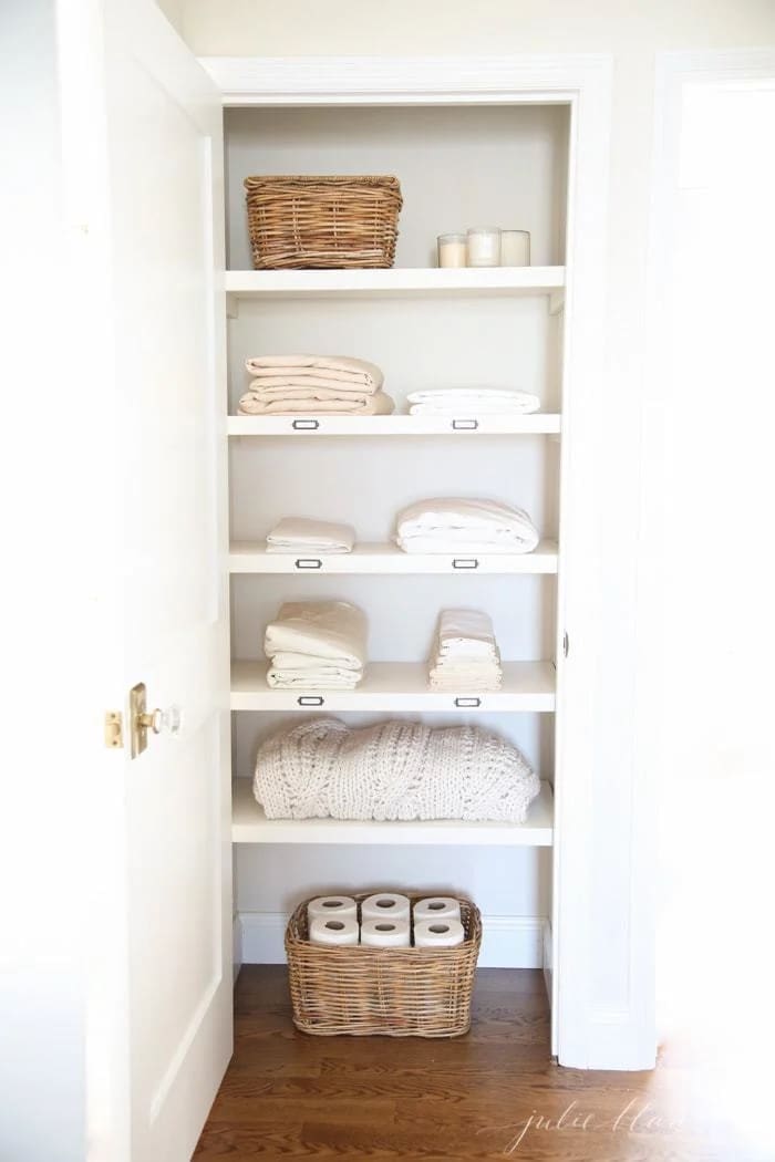 Minimalist organised linen closet