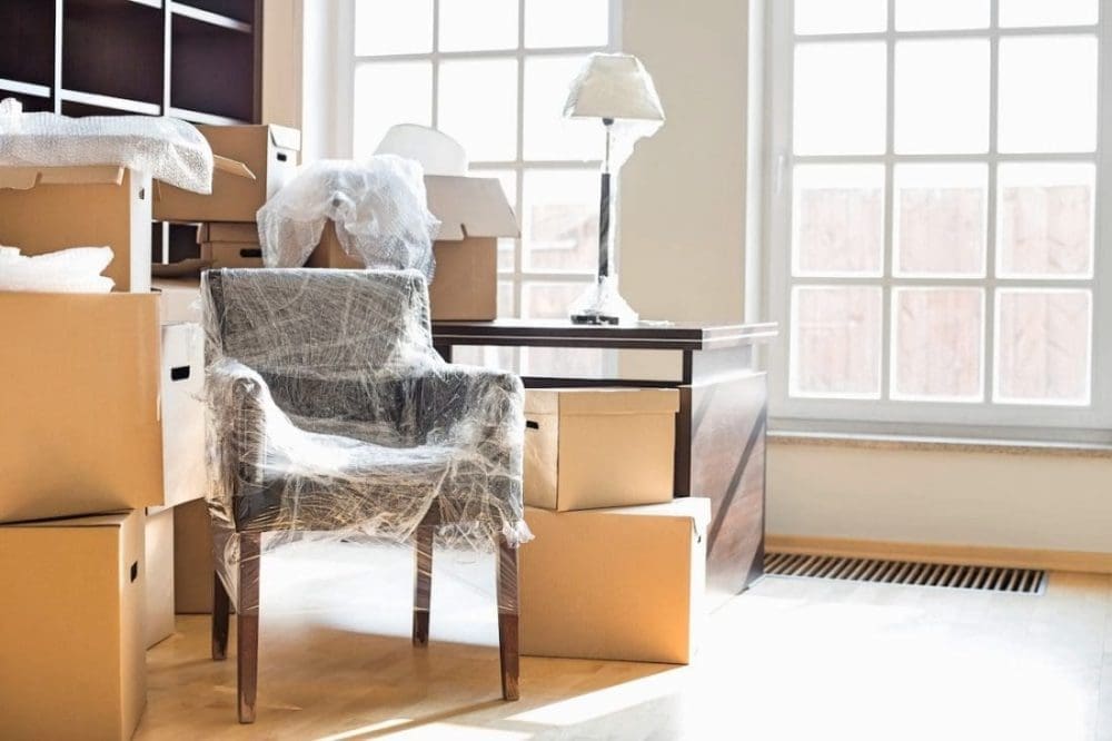 Moving boxes and furniture in new home