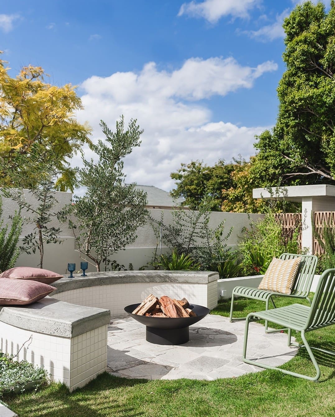 green chairs and white tiled curled bench seat