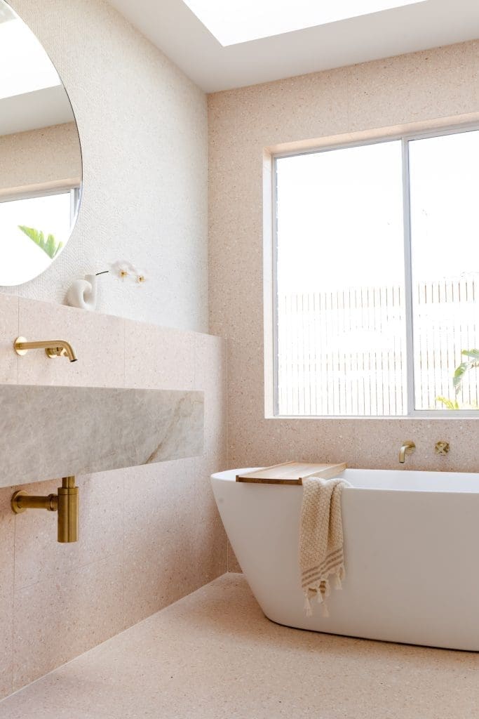Shelf wall behind bathroom vanity