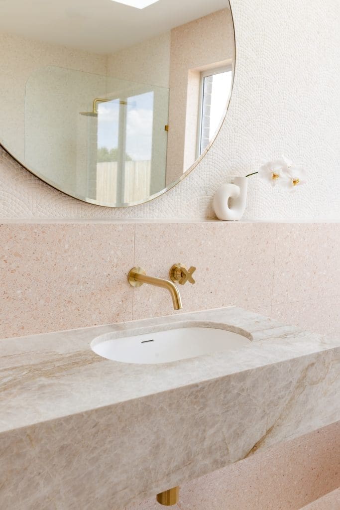 House of Harvee bathroom renovation - quartz vanity and organic mirror