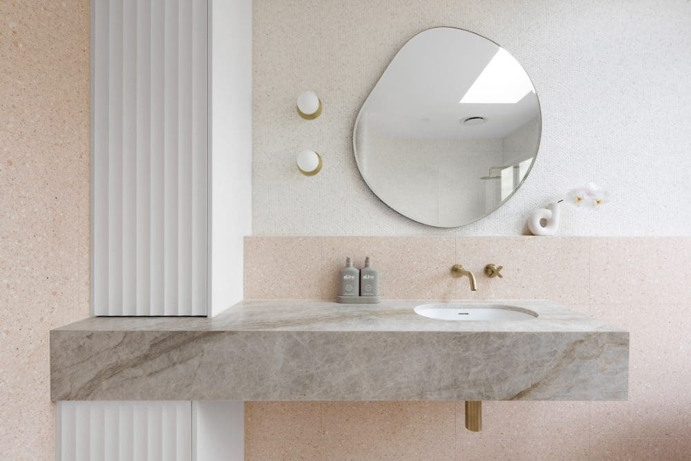 Wall hung vanity with curved joinery doors