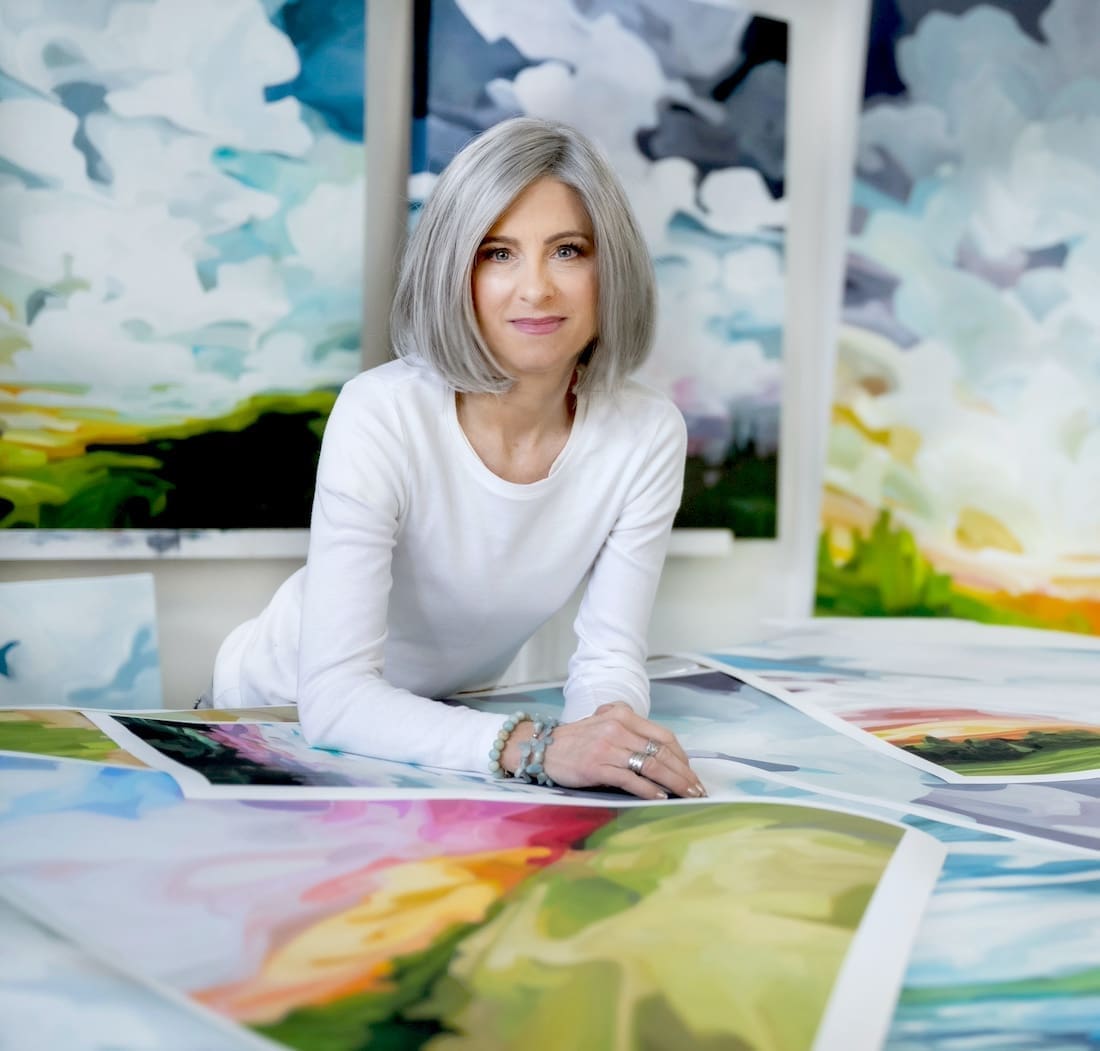 Susanna Bleasby from Susannah Bee Art surrounded by art