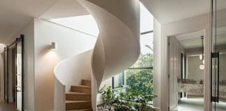 Spiral staircase and indoor garden in Kyal and Kara Bay Builds