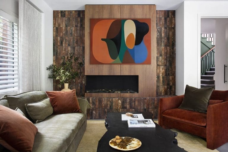 Retro tiles and artwork in living room of Warm Embrace residence by The Stylesmiths