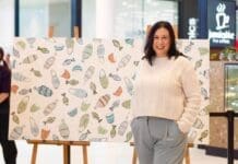 Karen Lee Mungarrja with artwork
