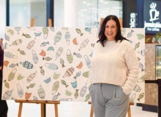 Karen Lee Mungarrja with artwork