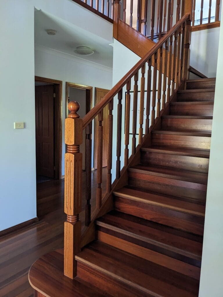 North Ryde before the makeover - 2000s dark timber staircase