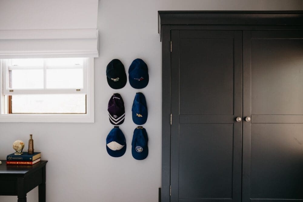 Storing caps in teen boy bedroom