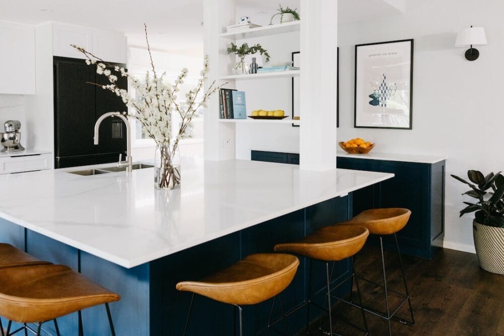Blue square island bench with white benchtop