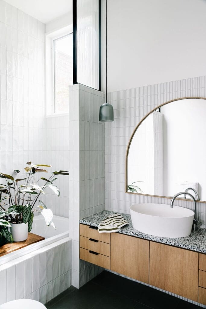 Monochrome and timber bathroom of Chatterbox House