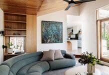 Living room at Chatterbox House with curved sofa