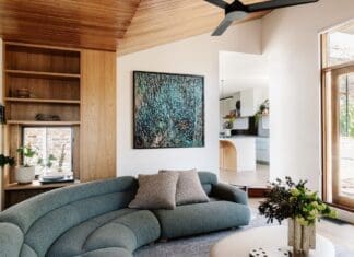 Living room at Chatterbox House with curved sofa
