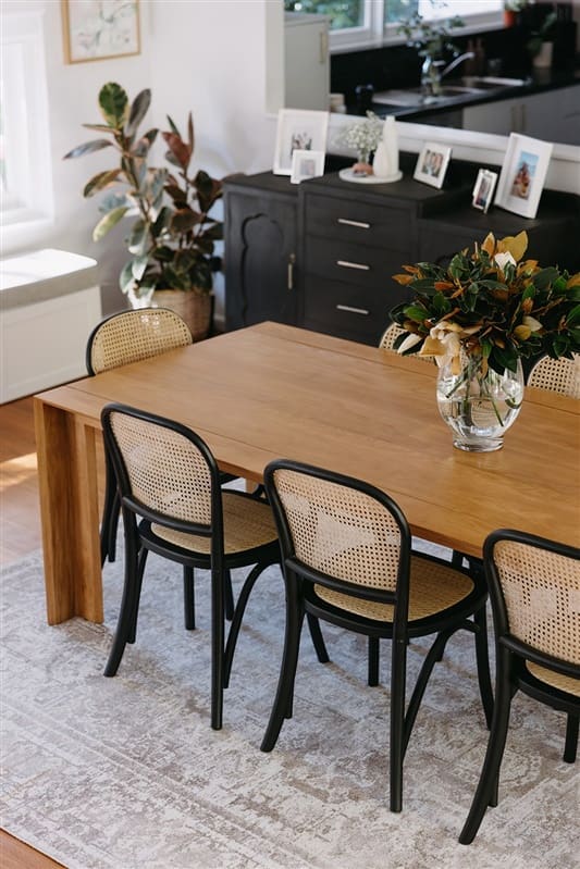 Black and rattan dining chairs