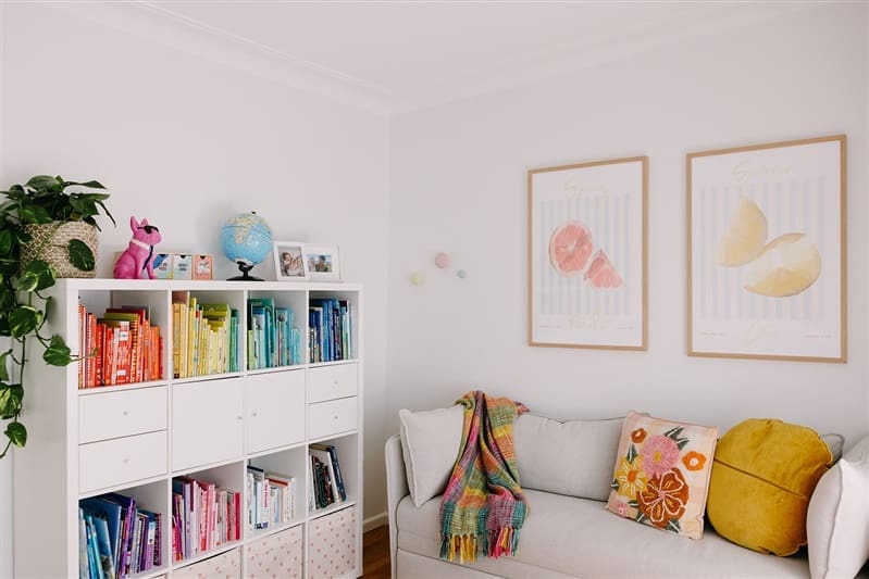 Play area for children with fruit artwork on walls