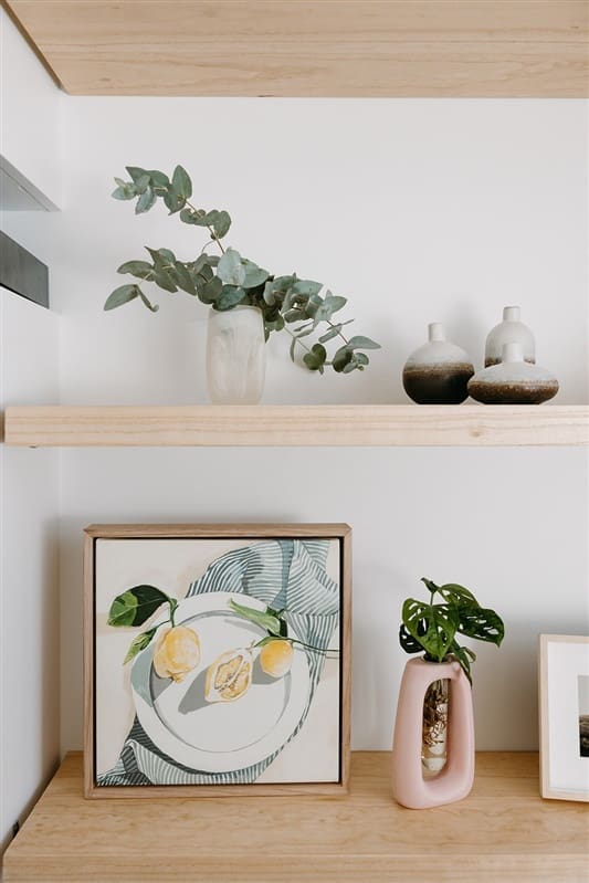 Shelf styling on floating shelves