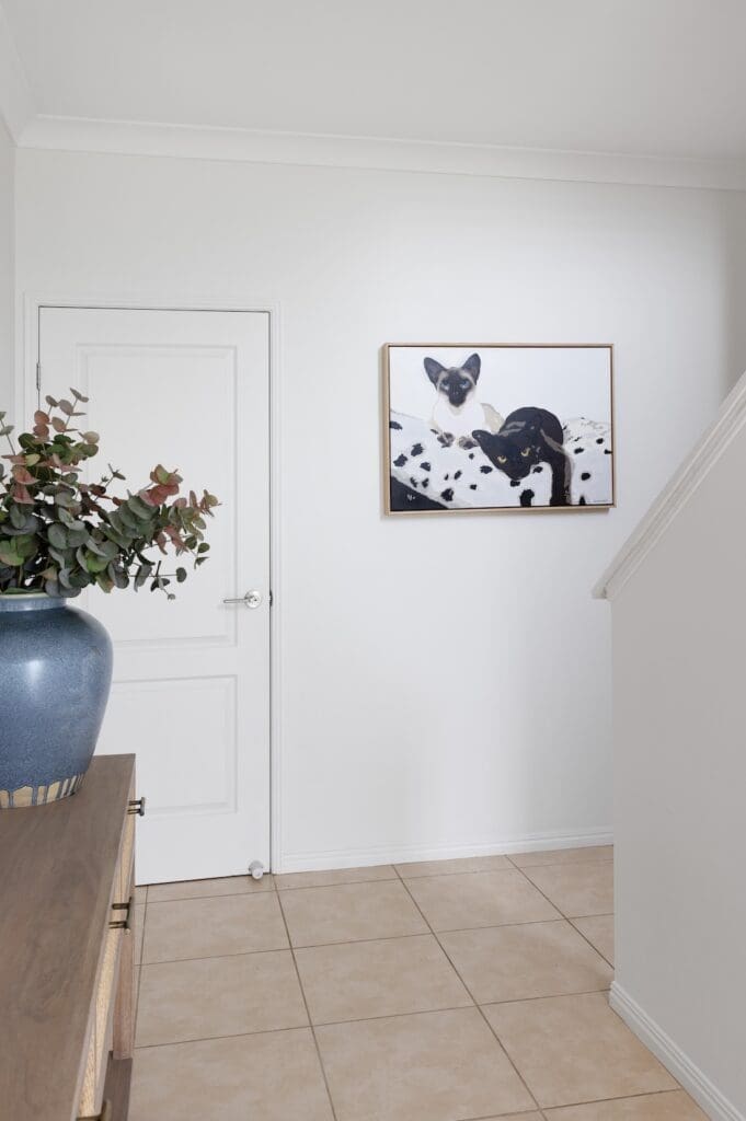Cat art in hallway