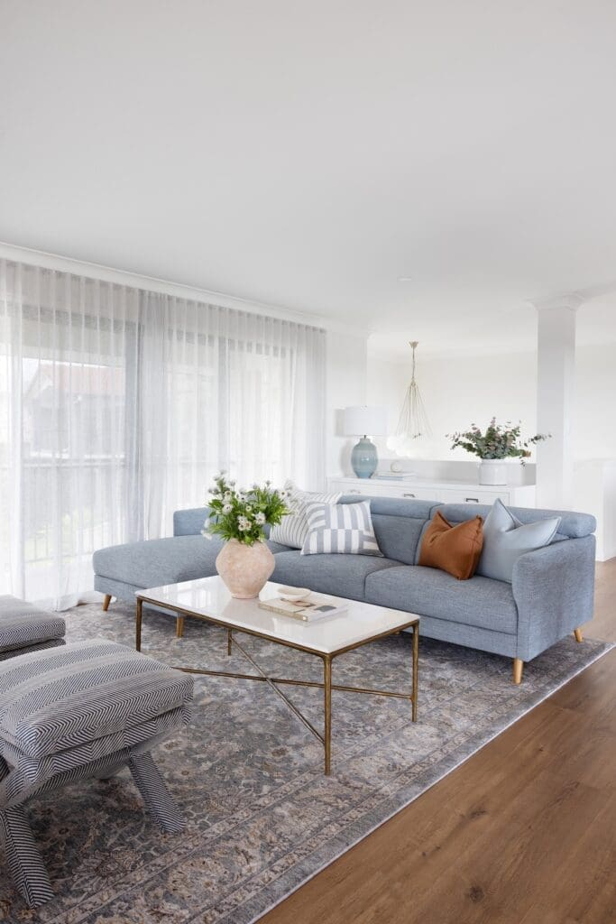 Modern country sitting room with blue couch