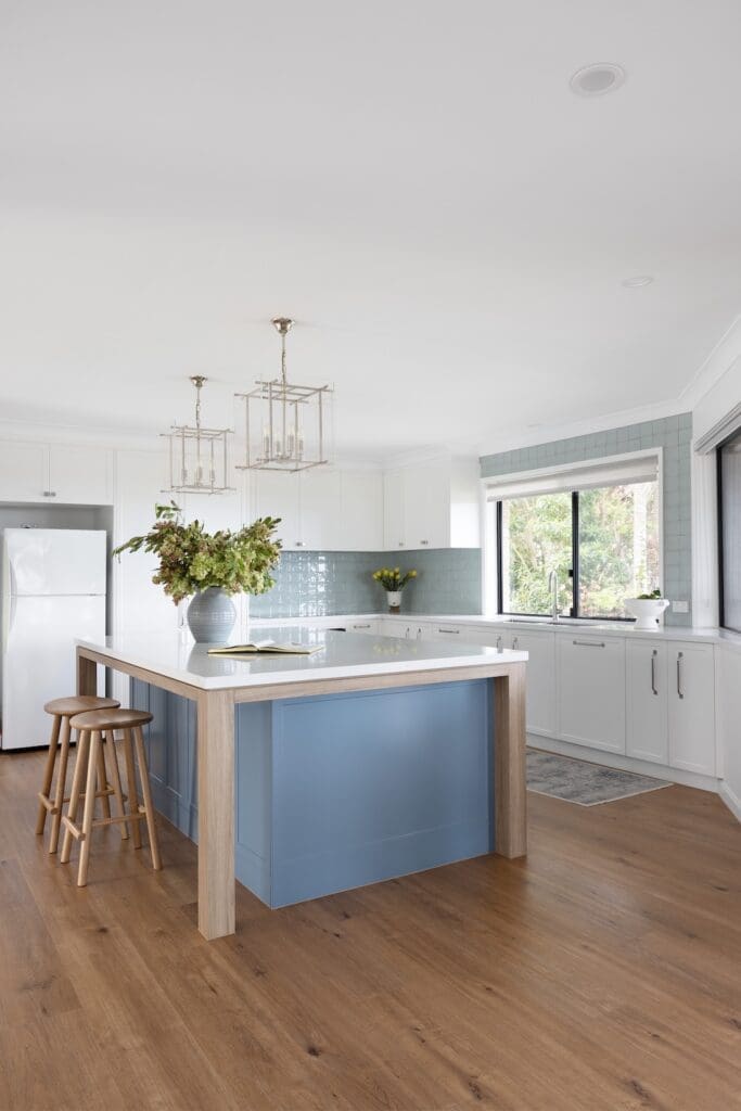Country style kitchen with blue kitchen island