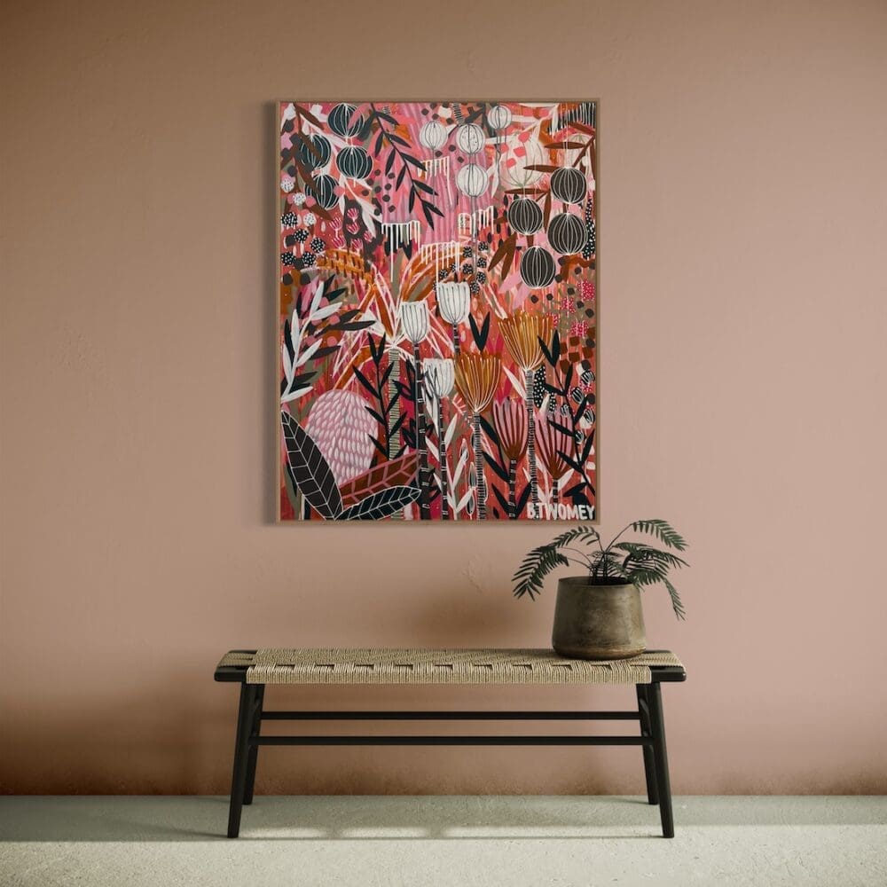Colourful botanical artwork from B Twomey above a bench seat