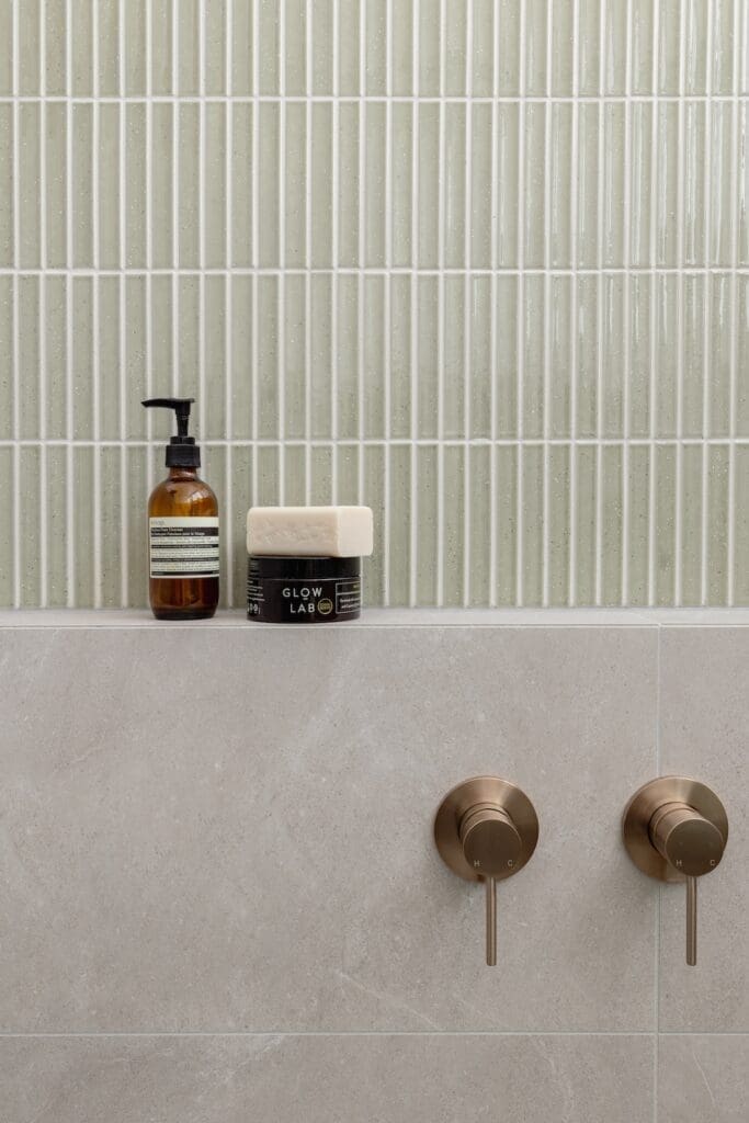 Mitred tile edge on shower shelf