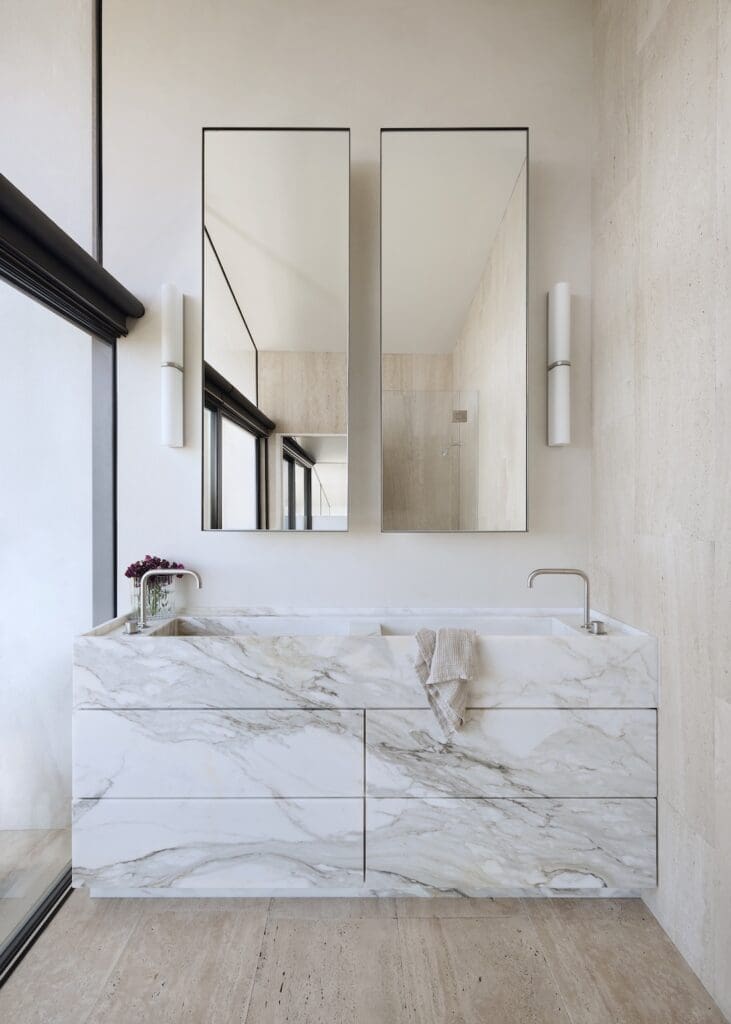 Callacatta Oro marble vanity in master ensuite of Meller House