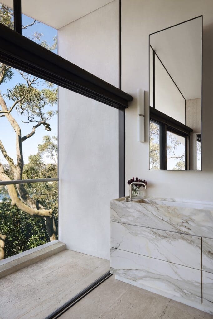 Luxury master ensuite with Callacatta Oro marble vanity with built in sink