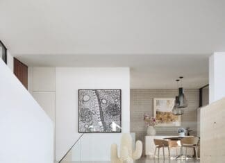 White modular sofa in quirky mid-century modern living room