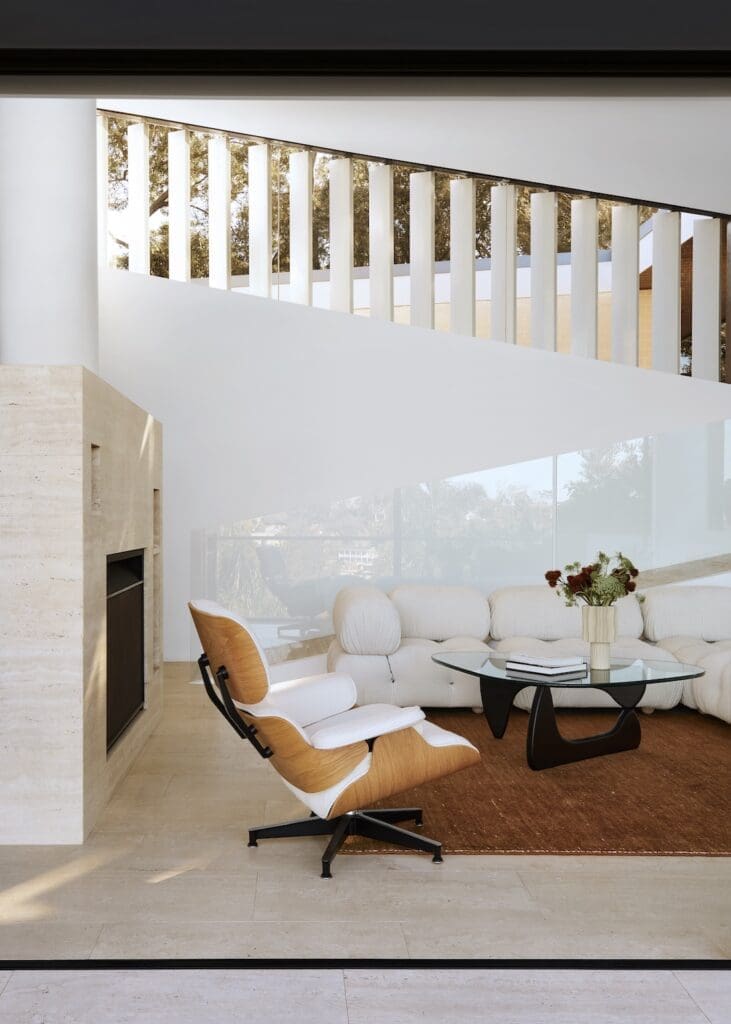 Mid-century modern living room with travertine fireplace