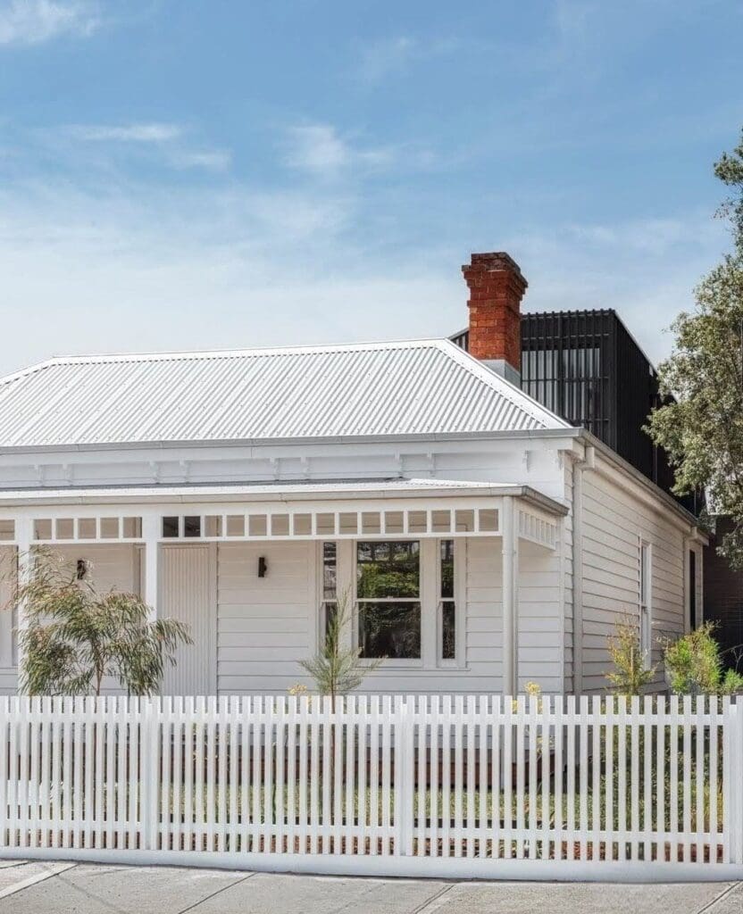 Classic heritage home with a peek of a modern extension out the back