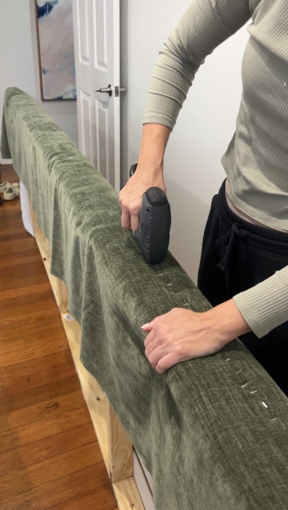Cover the bedhead in fabric