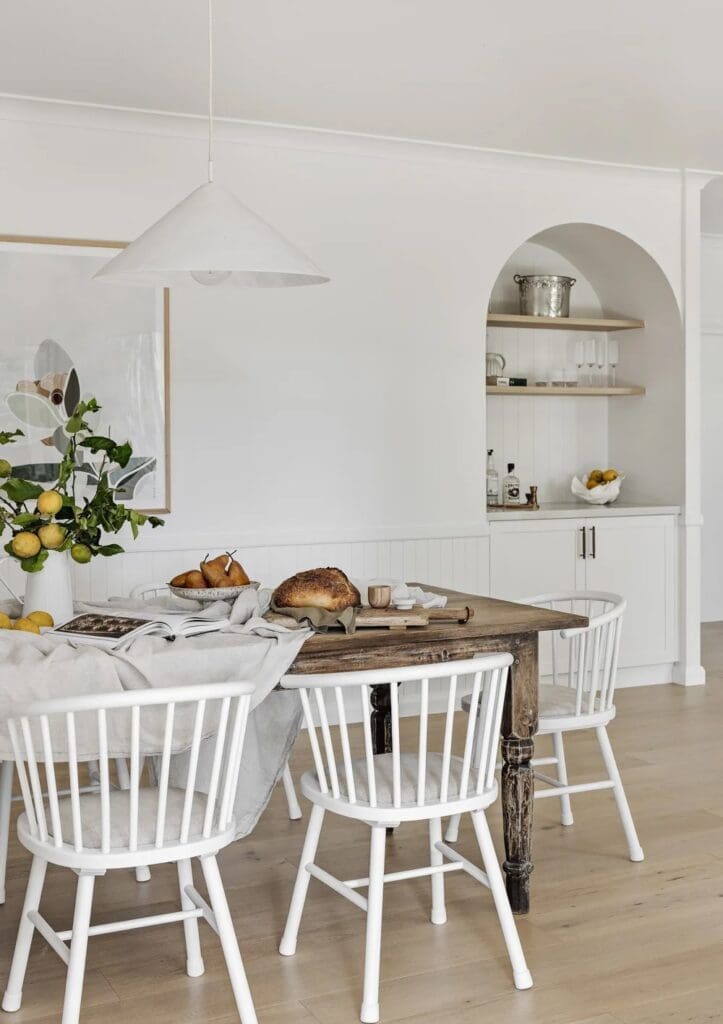 Dining table and built in bar area in Ewingsdale home