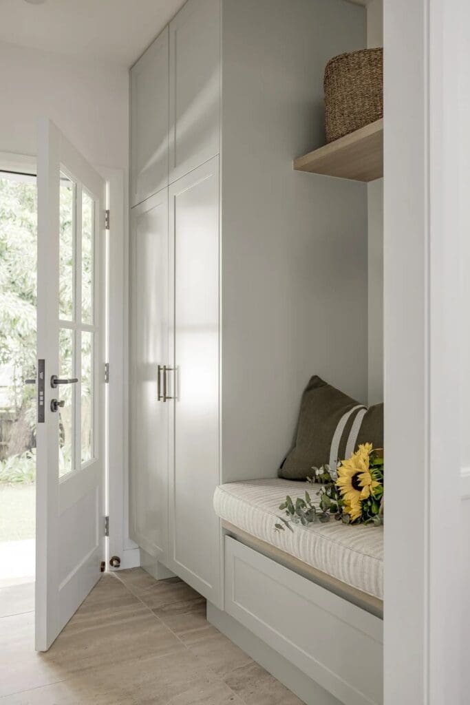 Entry mudroom seating nook in Ewingsdale home