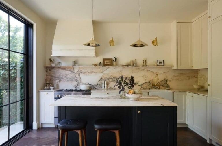 Marble kitchen renovation with black island