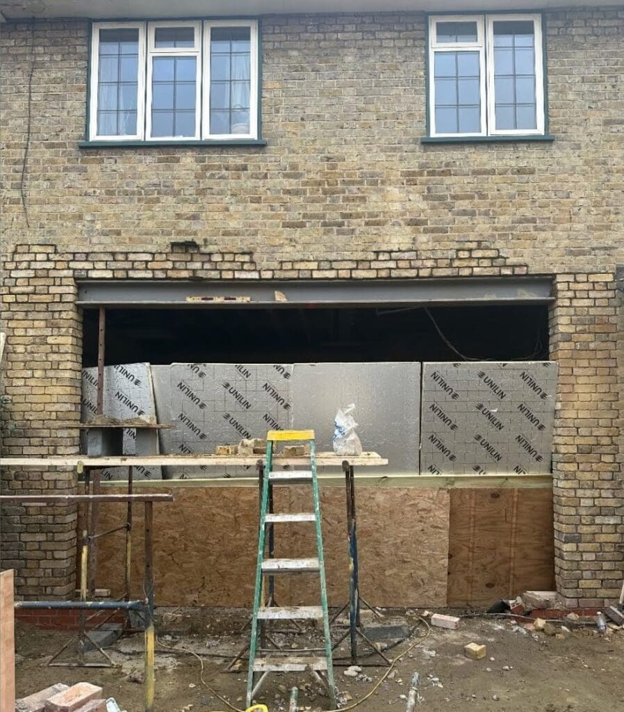 Marble kitchen renovation doors going in