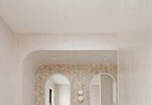 Everything you need to know about lighting your bathroom Bathroom with double vanity and reeded glass at The Stables Burraneer House