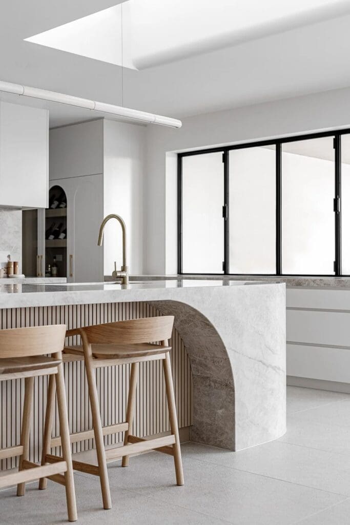 Curves of kitchen island bench at The Stables Burraneer House