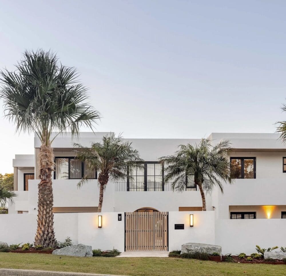 Front entrance with palm trees at The Stables Burraneer House