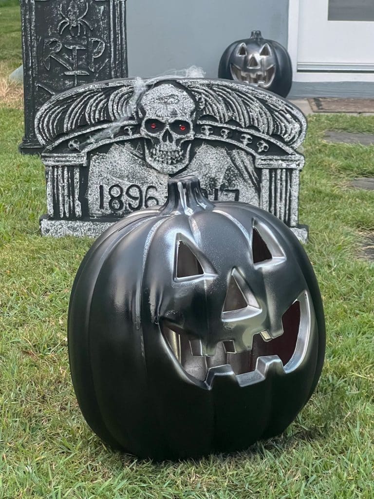 Halloween graveyard lit up with lanterns