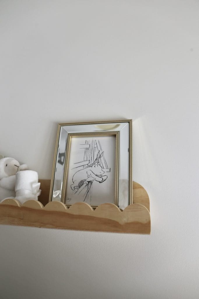 Scalloped edge floating shelf with Winnie the Pooh print